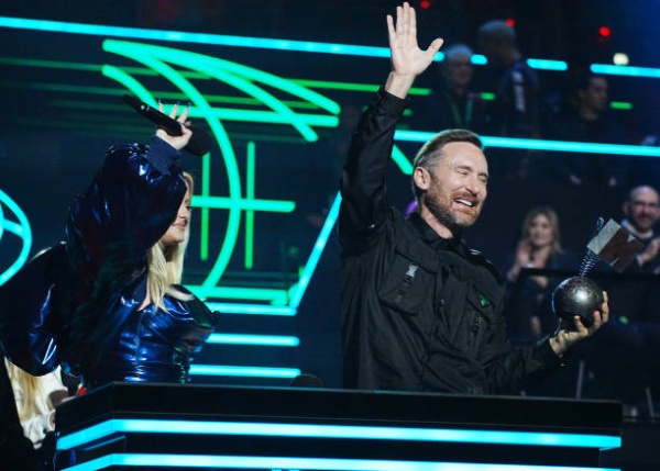 bebe-rea-and-david-guetta-accept-an-award-onstage-during-the-mtv-europe-music-awards-2022.jpg