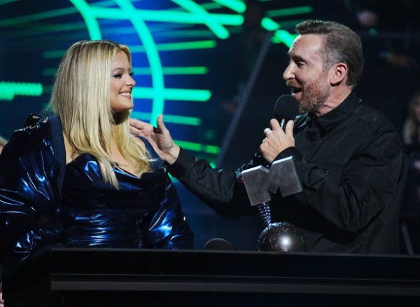 bebe-rexha-david-guetta-accept-an-award-onstage-during-the-mtv-europe-music-awards-2022.jpg