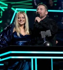 bebe-rexha-and-daid-guetta-accpt-an-award-onstage-during-the-mtv-europe-music-awards-2022.jpg
