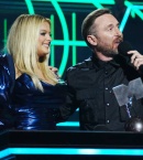 bebe-rea-and-daid-guetta-accept-an-award-onstage-during-the-mtv-europe-music-awards-2022.jpg
